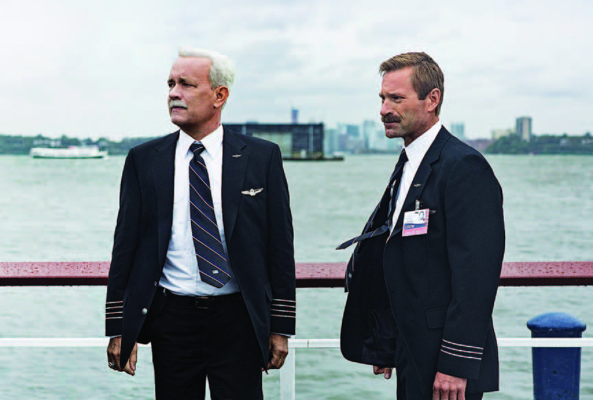 Hanks costars in the true-life tale with Aaron Eckhart as Jeffrey Skiles, Sullenberger’s copilot. Photography: Keith Bernstein/Warner Bros.