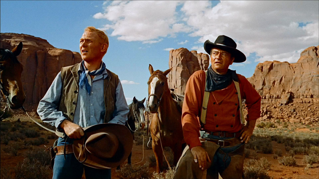 Harry Carey Jr. (left), John Wayne Photography: Warner Bros.