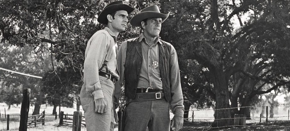 Dennis Weaver and James Arness in "Gunsmoke"