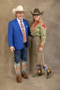 Mike Cavender (Vice President of Operations at Cavender's), poses with Kami Sisson in their Rocketbuster Boots.