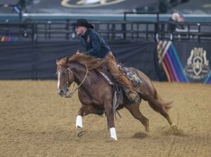 Justin Wright competing in rein work segment of the 2023 American Performance Horseman.