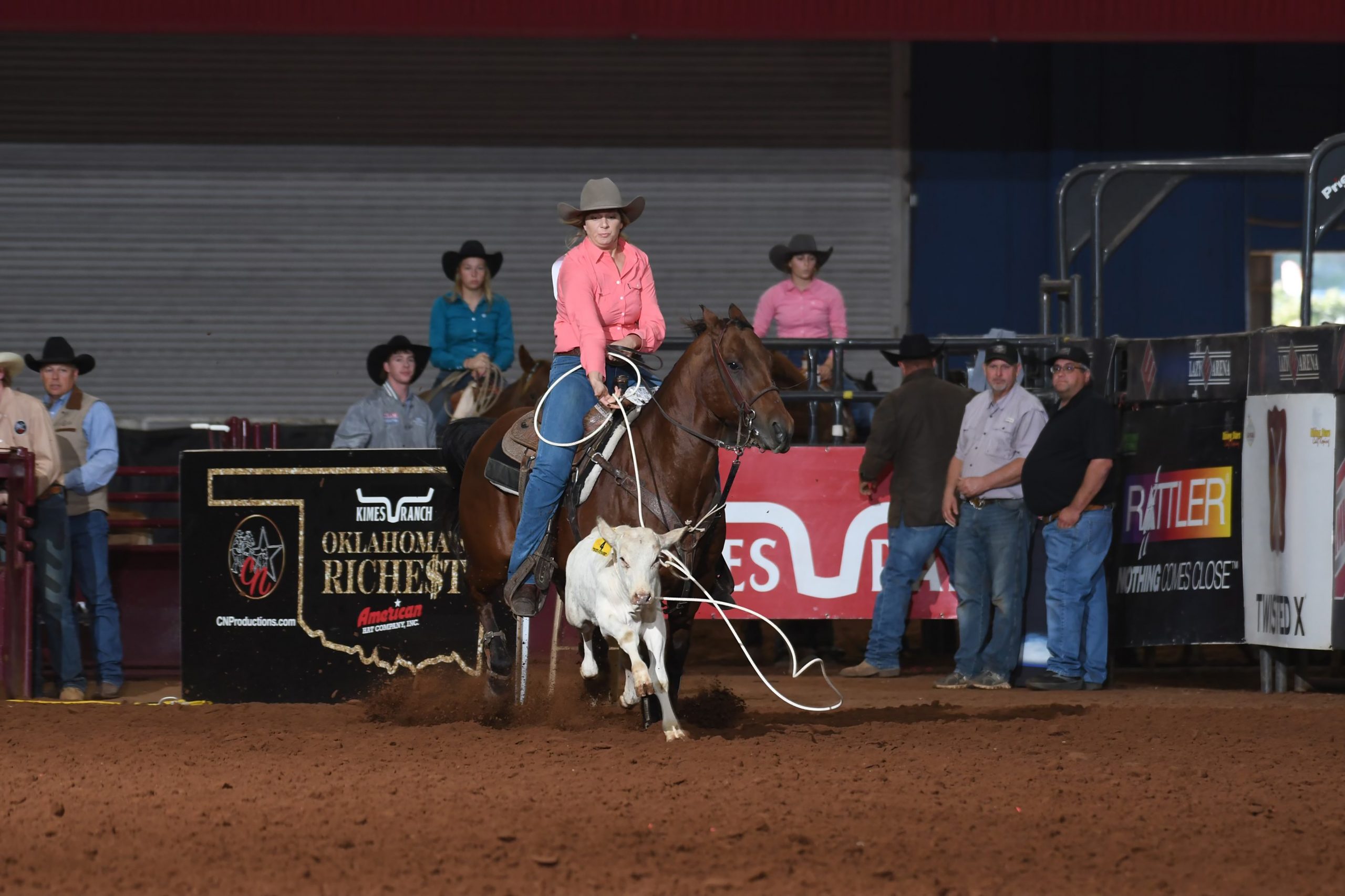 Andrea Lien lassos a calf during a breakaway roping competition.