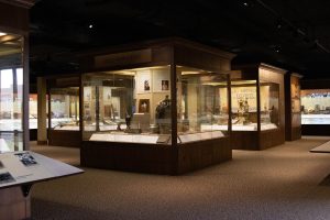 Artifacts and photos are displayed in display cases at the American Quarter Horse Association Museum.
