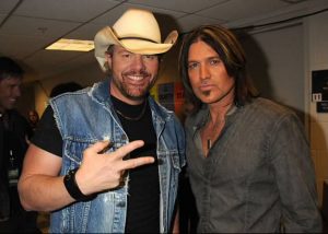 Toby Keith poses with Billy Ray Cyrus.