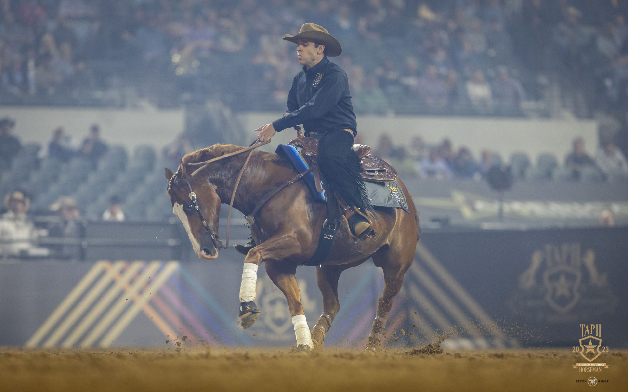 Fernando Salgado competes in a reining competition during the 2023 American Performance Horseman competition.