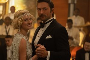 Julia Schlaepfer as Alexandra and Brandon Sklenar as Spencer in "1923"