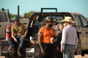Jacob Lofland as Cooper Norris, Mustafa Speaks as Boss and Billy Bob Thornton as Tommy Norris in "Landman."