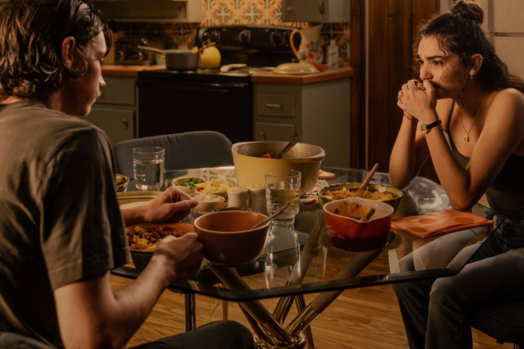 Jacob Lofland as Cooper Norris and Paulina Chávez as Ariana