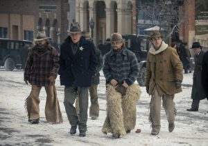 Harrison Ford as Jacob Dutton, Darren Mann as Jack Dutton and Caleb Martin as Dennis in season 2, episode 1 of "1923"