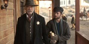 Pierce Brosnan and Brandon Lessard in "The Unholy Trinity"