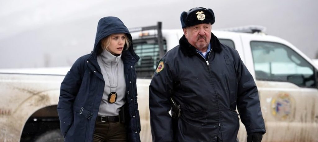 Elizabeth Olsen and Graham Greene in "Wind River"