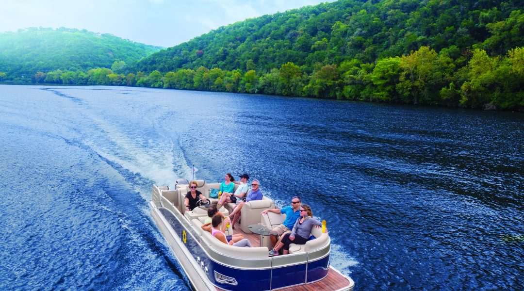 Pontoon Boat on Lake Austin from above Cowboys and Indians Magazine